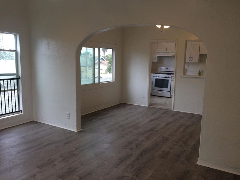 Living-room, Dinner-room, and kitchen view from entry