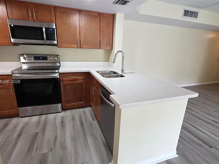 5051 Wiles Rd #201 — Photo 6