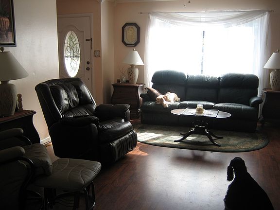 living room...new laminate floors thru out house