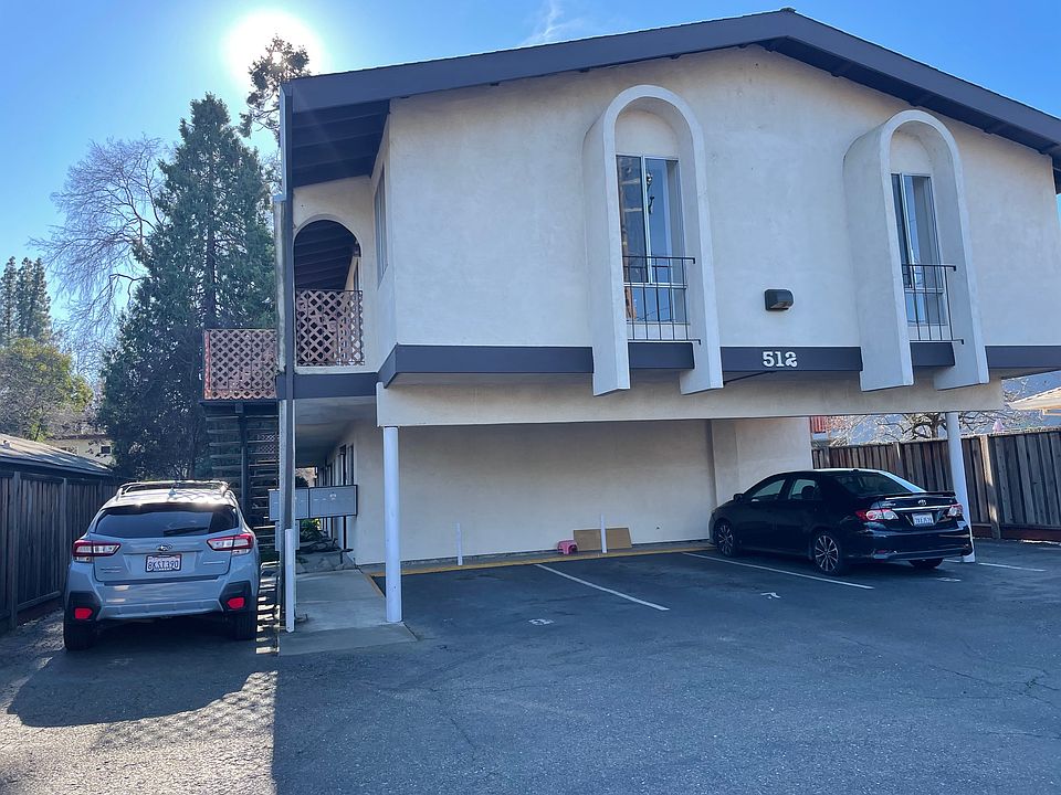 Close up of front of complex and Parking area one space per unit