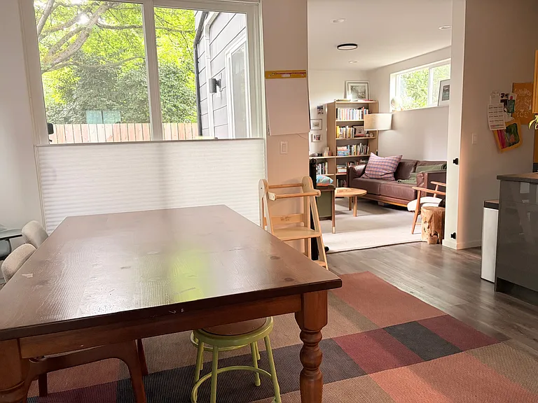 Dining and work area. Sliding glass doors open onto patio and backyard