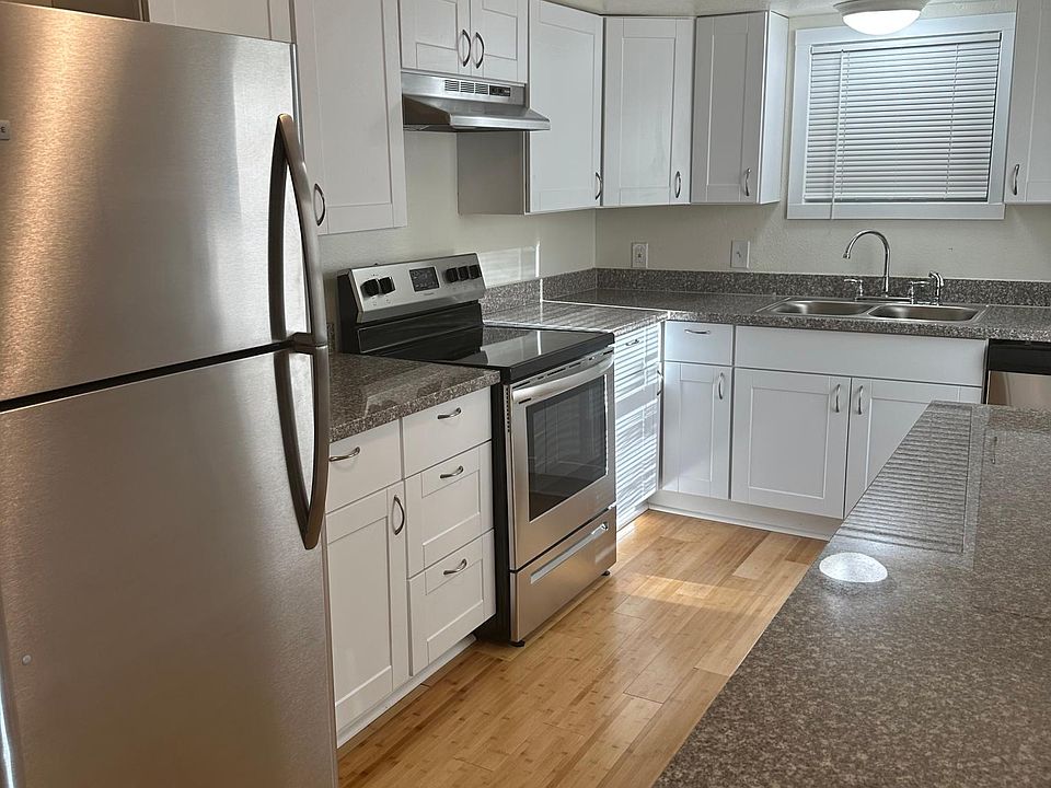 Kitchen has bamboo flooring, Stainless Steel Appliances, Granite counters,