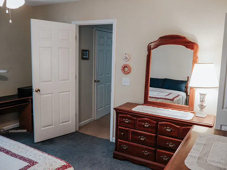 Desk behind bedroom door