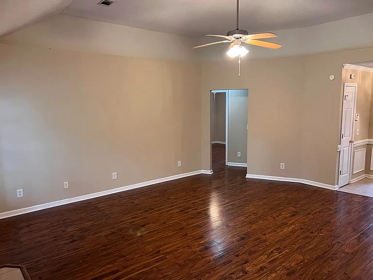 Spacious living room with tall vaulted ceilings