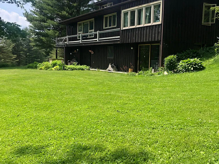 Front yard for the apt which is on the first floor with 2 sliding doors.