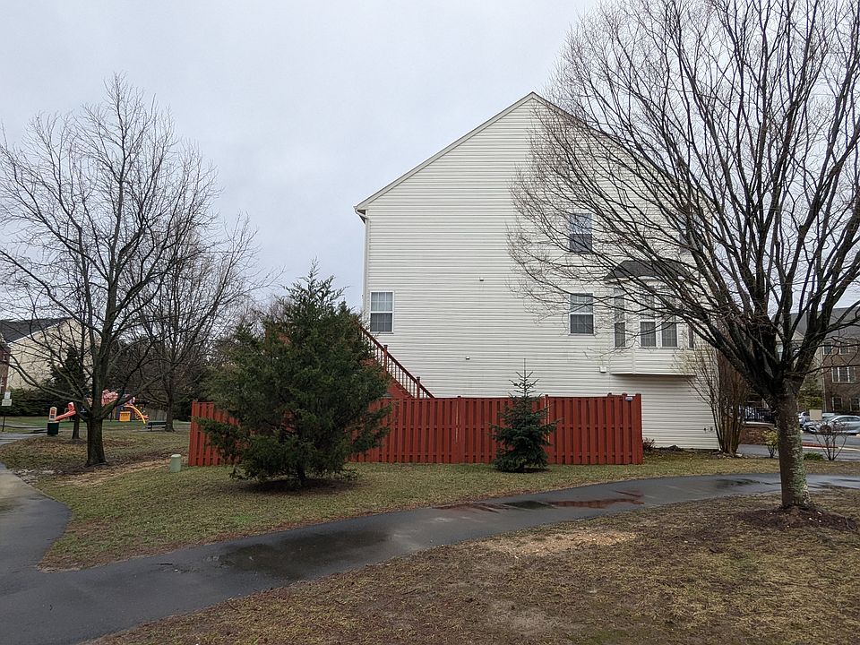 End unit, side of home, fenced back yard