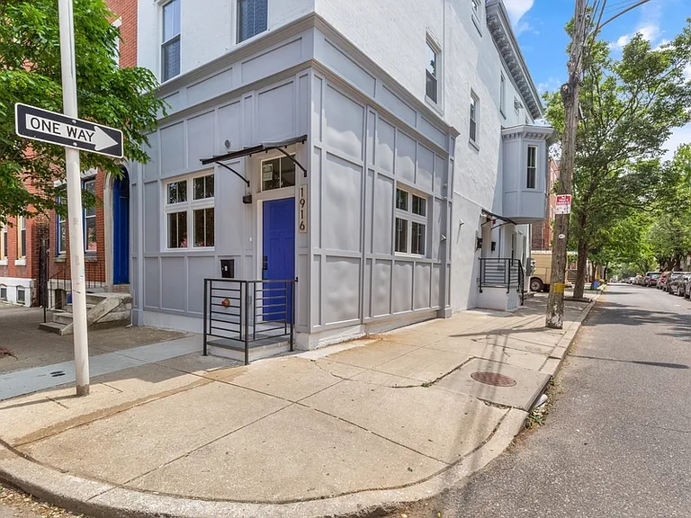 The building dates back to 1928. It was fully renovated and first rented in 2023. Access to the bi-level apartments is through the entrance on Uber Street.