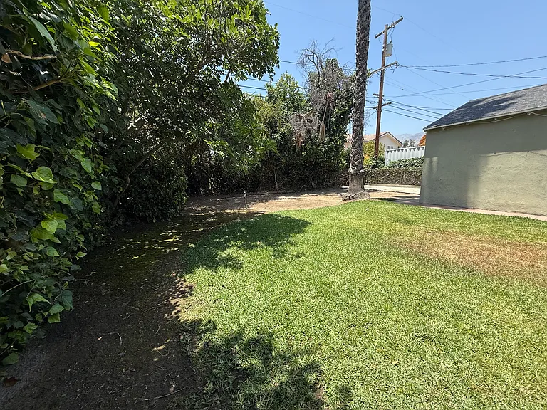 Backyard including space for container gardening