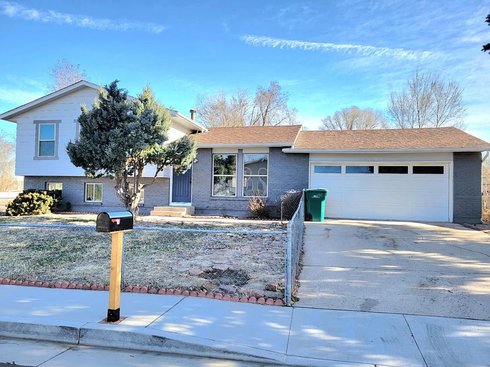 Front view, with a 2-car garage.