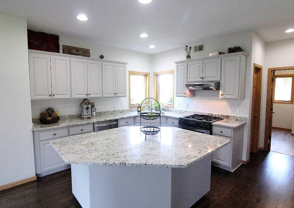 Better than new! Freshly painted and move-in ready home overlooking the golf course.
