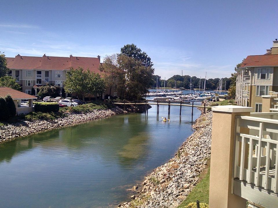 View standing on back deck. Quiet cove with Marina view.