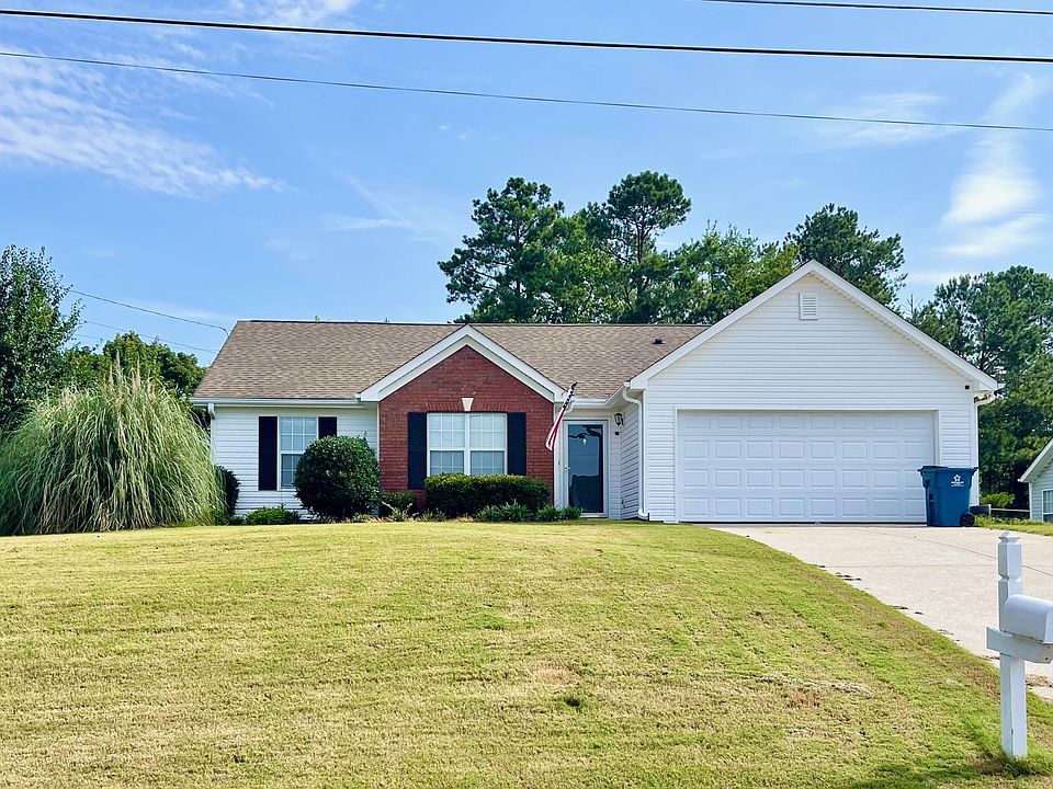 Charming updated ranch with brick accents and a two-car garage in Eagle Watch
