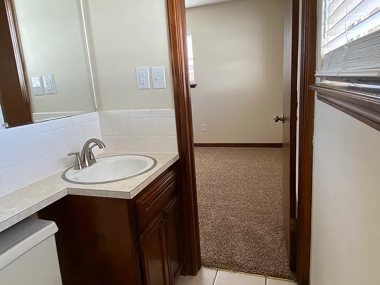 5709 NW Briarwood Dr — Photo 18