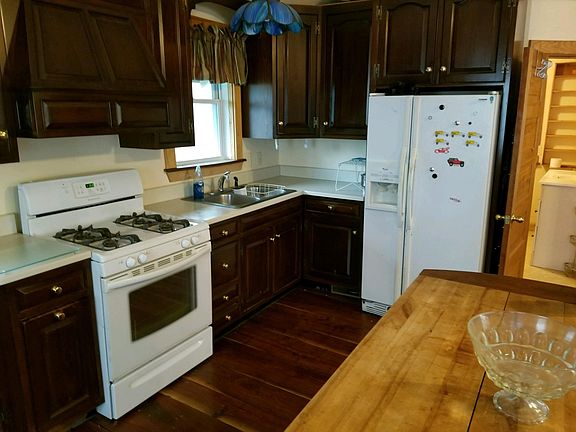 full size kitchen with cherry cabinets