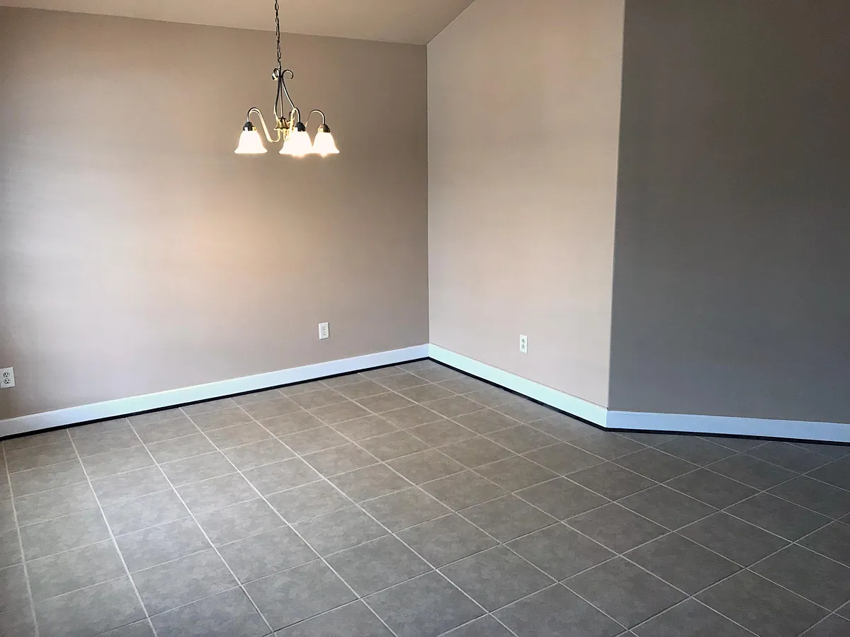 New ceramic tile in dining room, foyer, kitchen, utility - 4039 Cambridge Dr