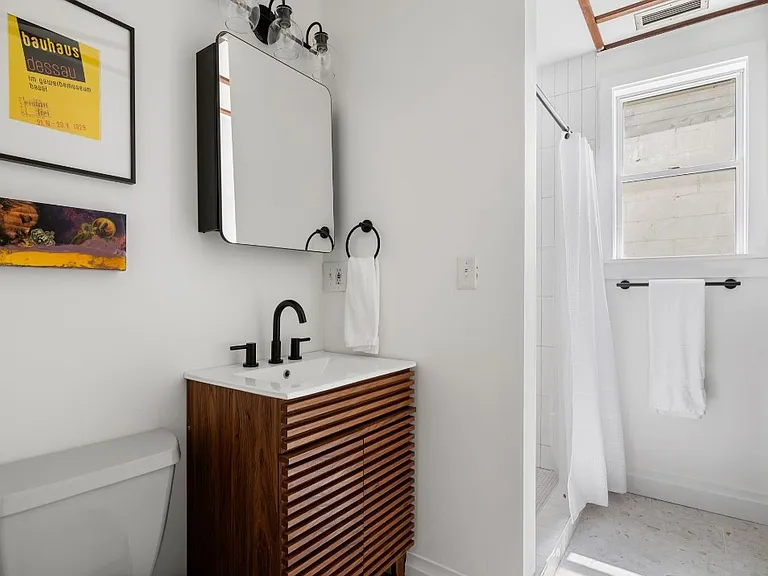 new shelves located above toilet