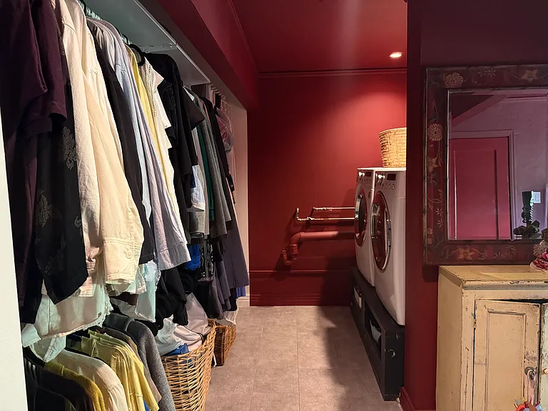 primary bedroom closet/laundry area
