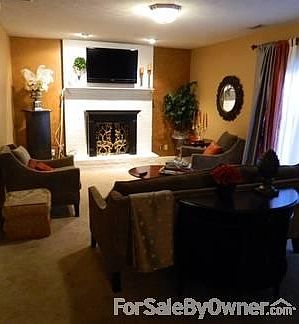 Impressive Family Room with fireplace