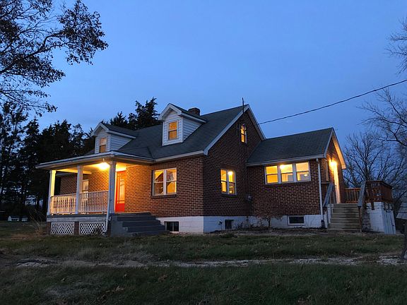 Brick Cape Cod with 4 bedrooms