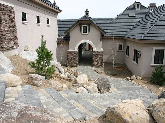 Front Entry with cascading waterfall features