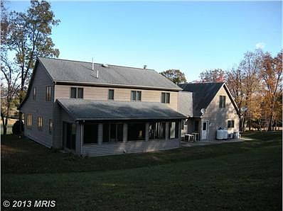 Terrific all season sunroom across back.