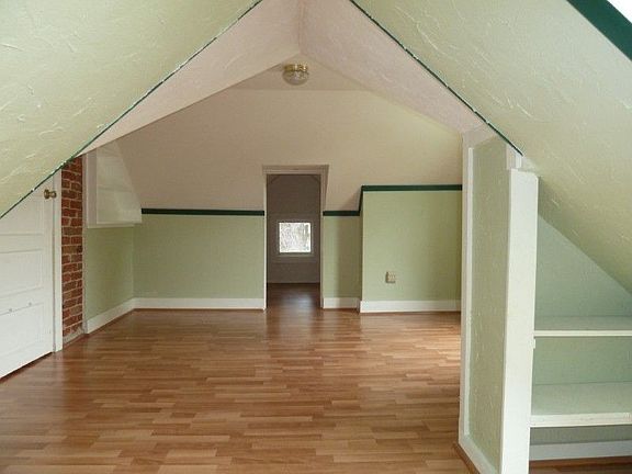 This is the main bedroom upstairs. Both rooms upstairs are smaller. The back of the home has a beaut