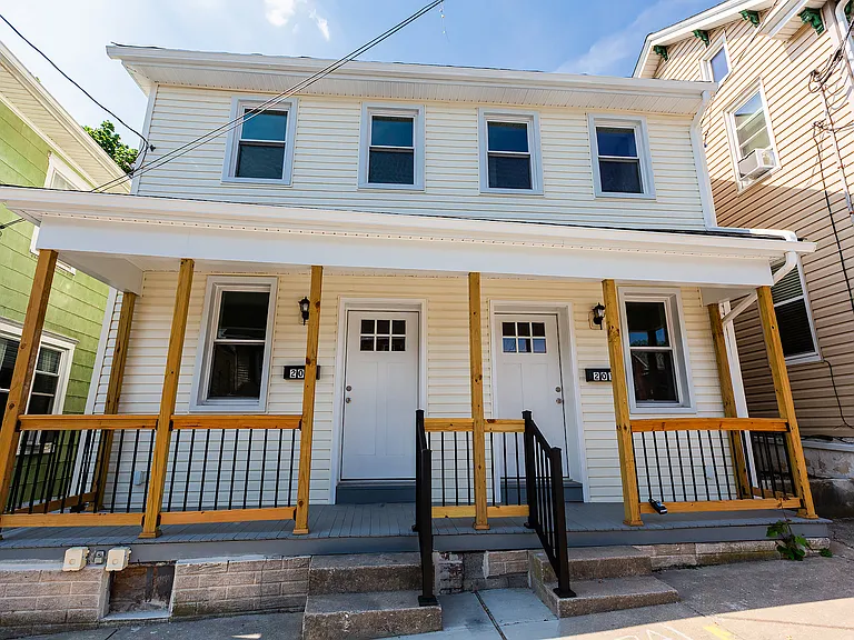 Front of house. 203 is on the left side and 201 is right side of property.