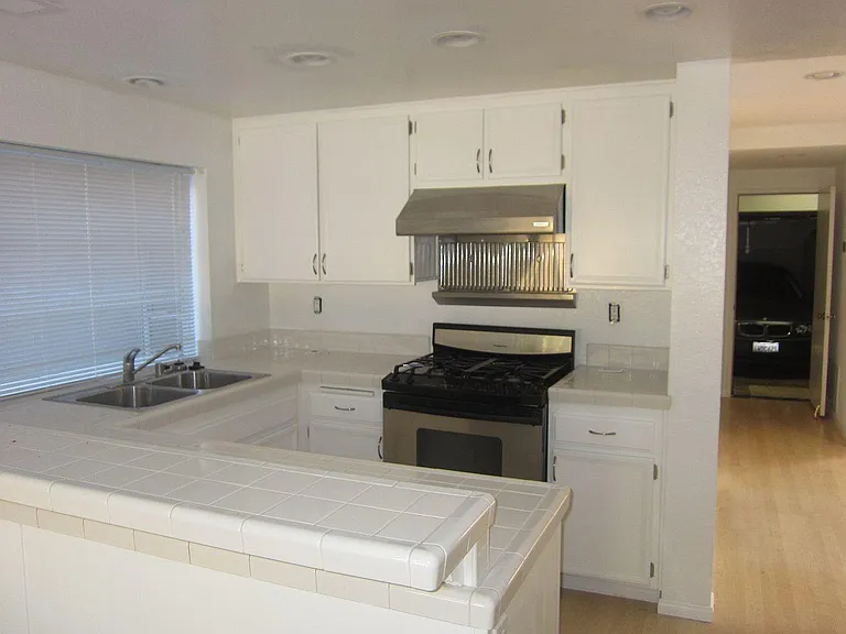 kitchen with range and dishwasher