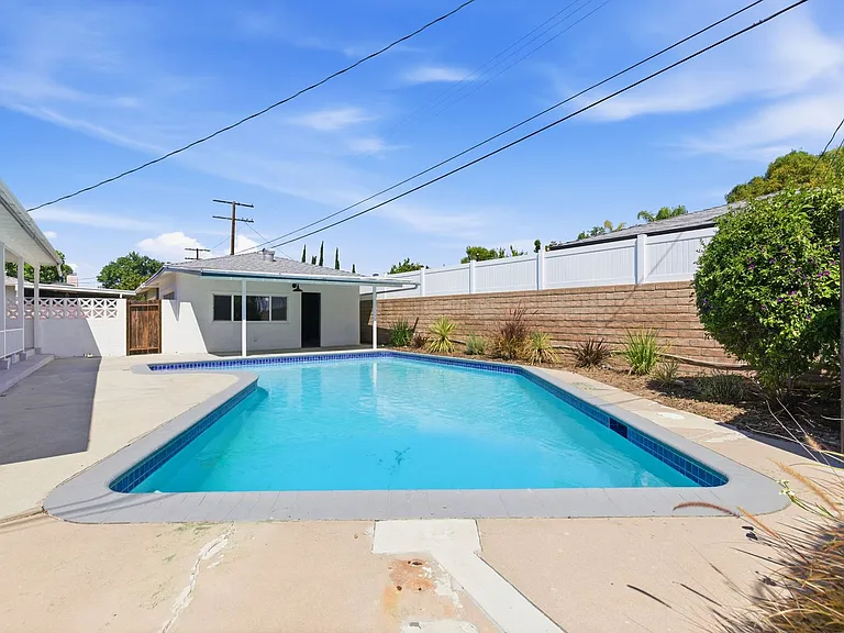 16257 Los Alimos St — Photo 12