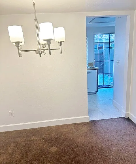 Dining Room Chandelier, Peek at security gate from Kitchen to Patio