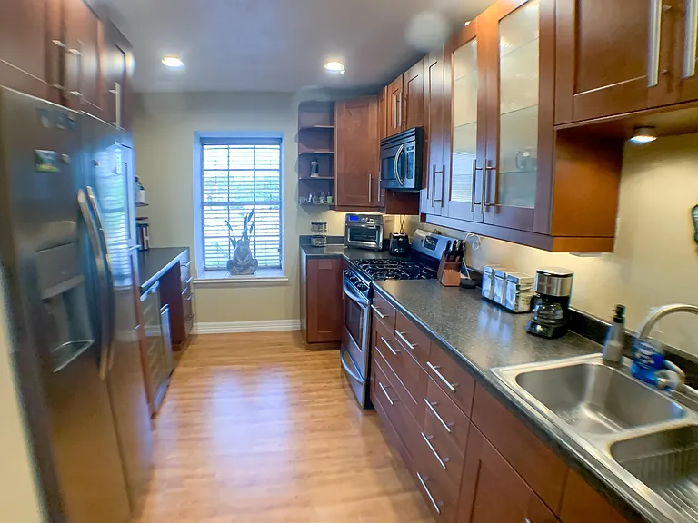 Amazing kitchen with stainless steel appliances.