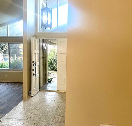 Entry with vaulted ceilings and lots of light.