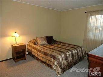 Master bedroom features customized double closet and full bath.