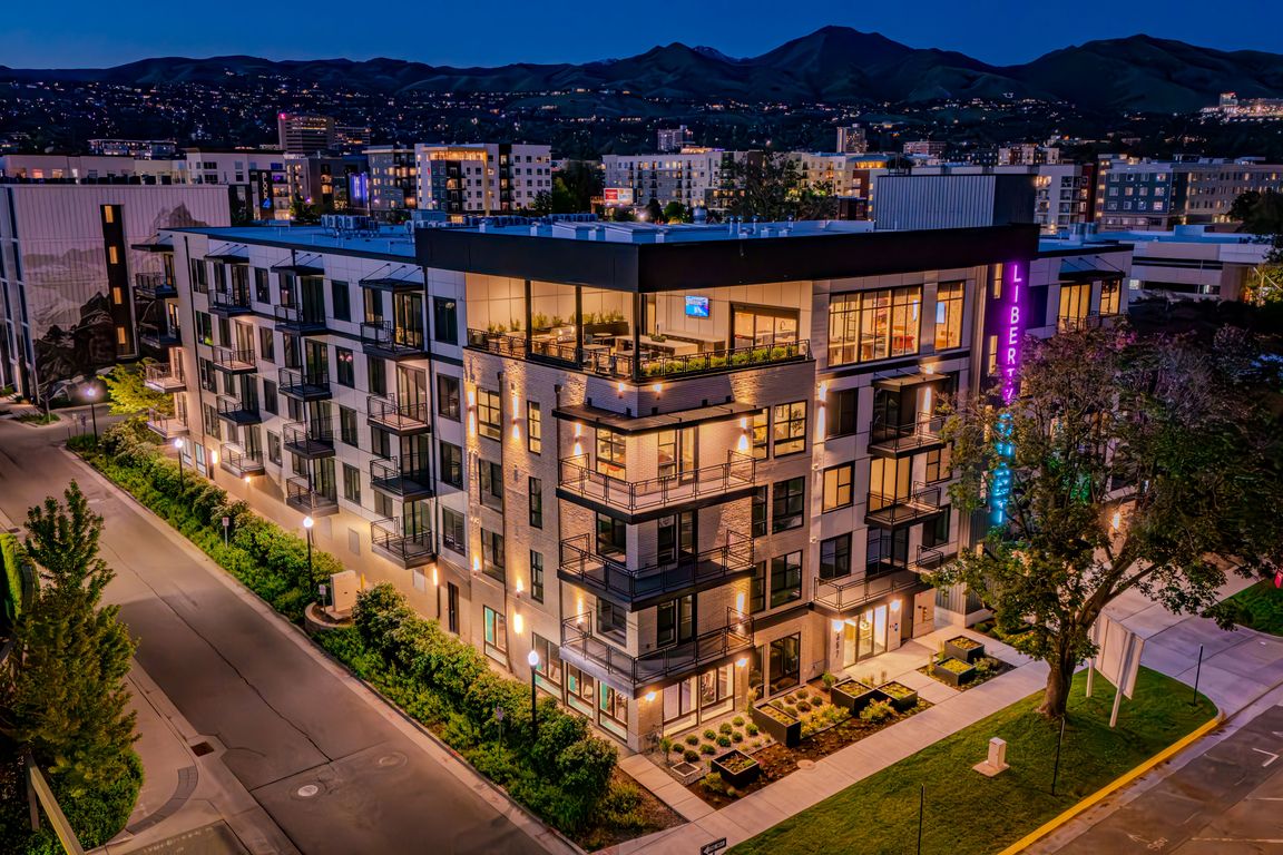 Liberty Duet Apartments, Salt Lake City, Utah; exterior well-lit front at night.