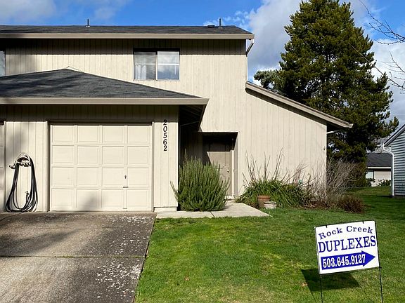 Front of unit showing attached garage