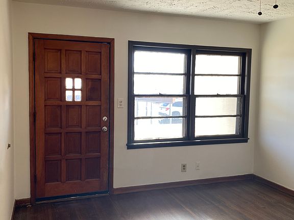 living room - view of front door and front window