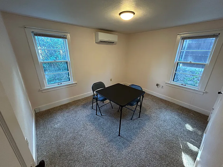 Slightly smaller south bedroom with own heat pump & AC.