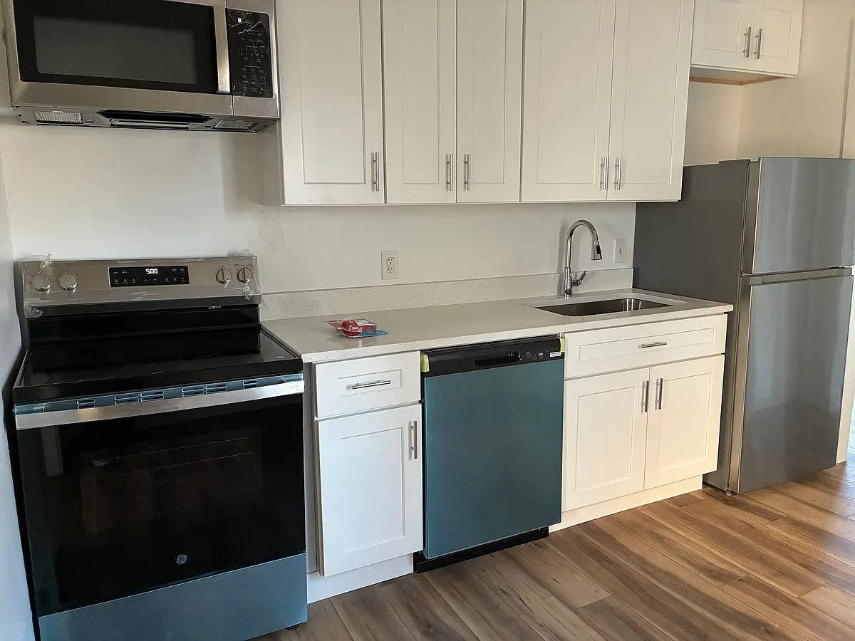 Brand new kitchen includes new dishwasher, microwave, refrigerator,& stove. Room for a table and chairs. - 14424 Borgman Ave