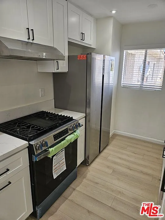 Building Photo - 10836 Camarillo St #4