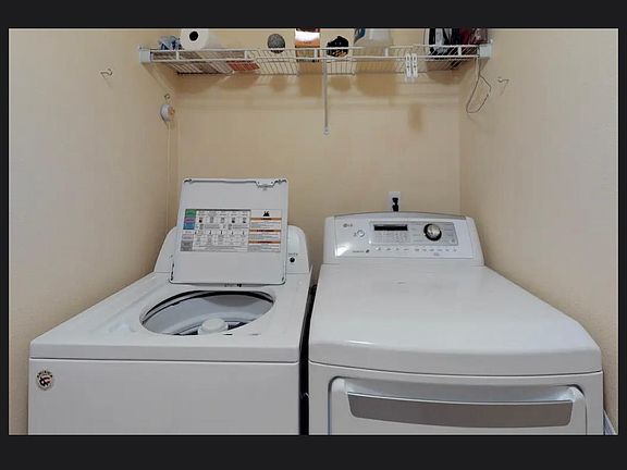 separate laundry room, near garage and half bath