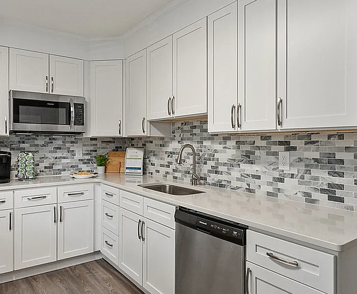 Experience cooking in this chic and contemporary kitchen, designed for both elegance and efficiency.