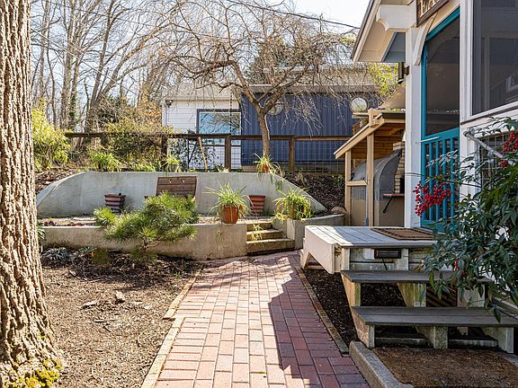 In the spring and summer the front yard becomes its own outdoor living space.