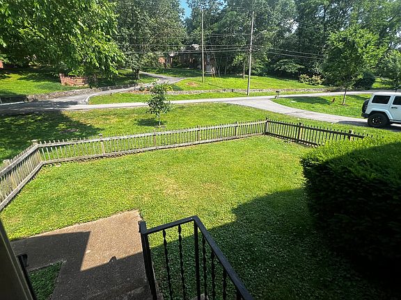 private fenced front yard area