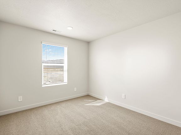 The Cottonwood floorplan interior image taken at a Meritage Homes community in Eagle Mountain, UT.
