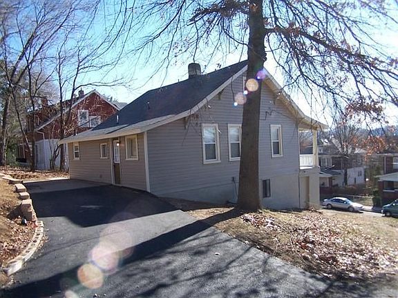 Rear Exterior - Patio and Driveway