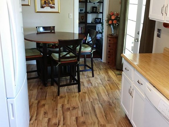 Kitchen (facing dining area and Bedroom #3)