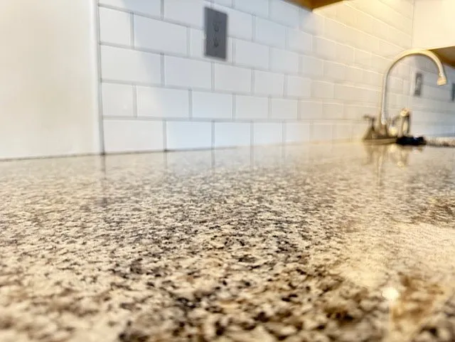 Suvway title and granite counter tops