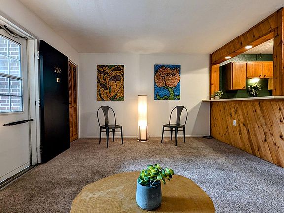 Plenty of room to have a dining set and barstools.