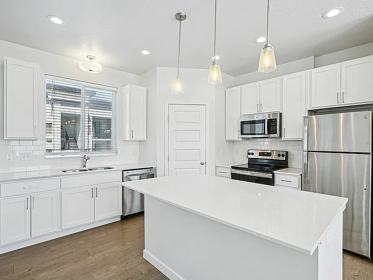 Modern kitchen with stainless steel appliances