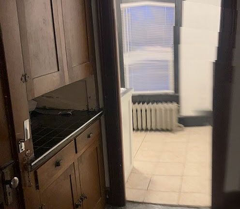 View from outside Kitchen in hallway between Living Room and Bedroom